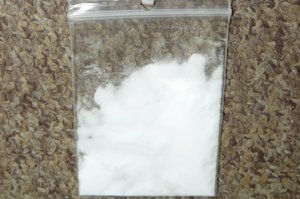 zdjęcie poglądowe, woreczek strunowy z białą substancją