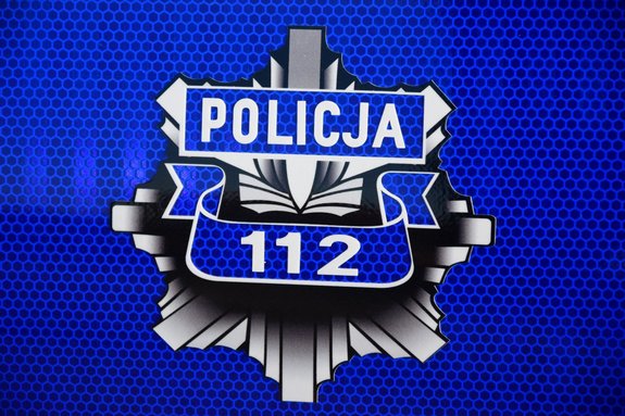 Odznaka policyjna, z napisem Policja 112